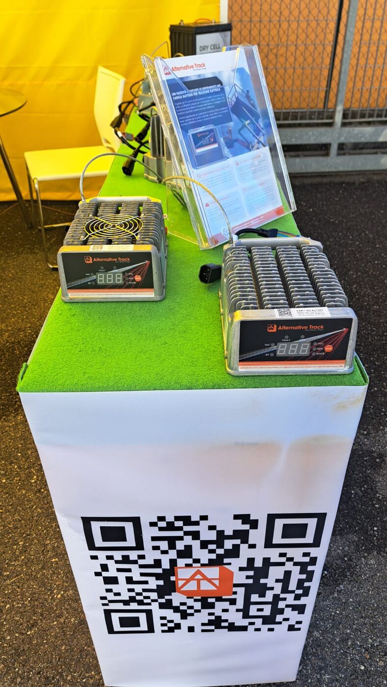 ALT chargers and product literature at the booth