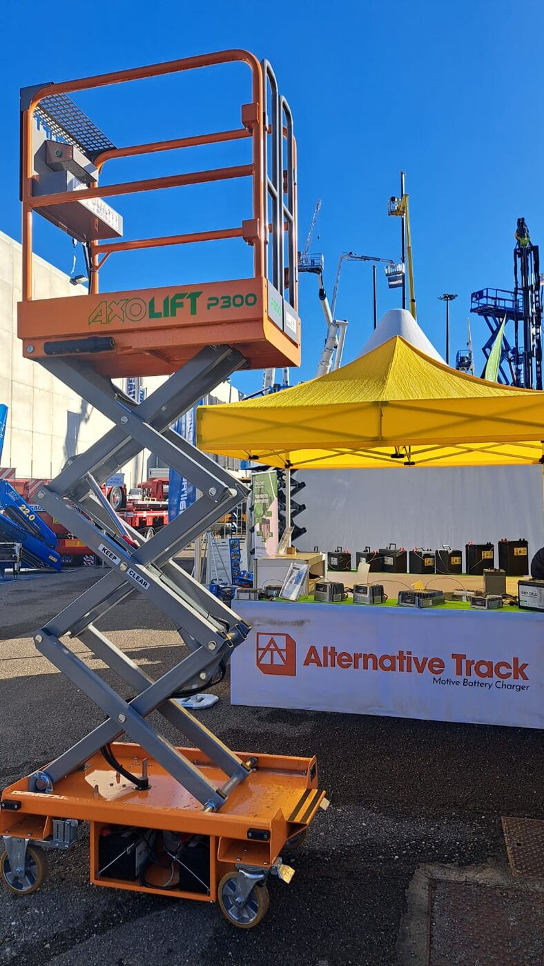 AXOLIFT P300 scissor lift outside the Alternative Track tent